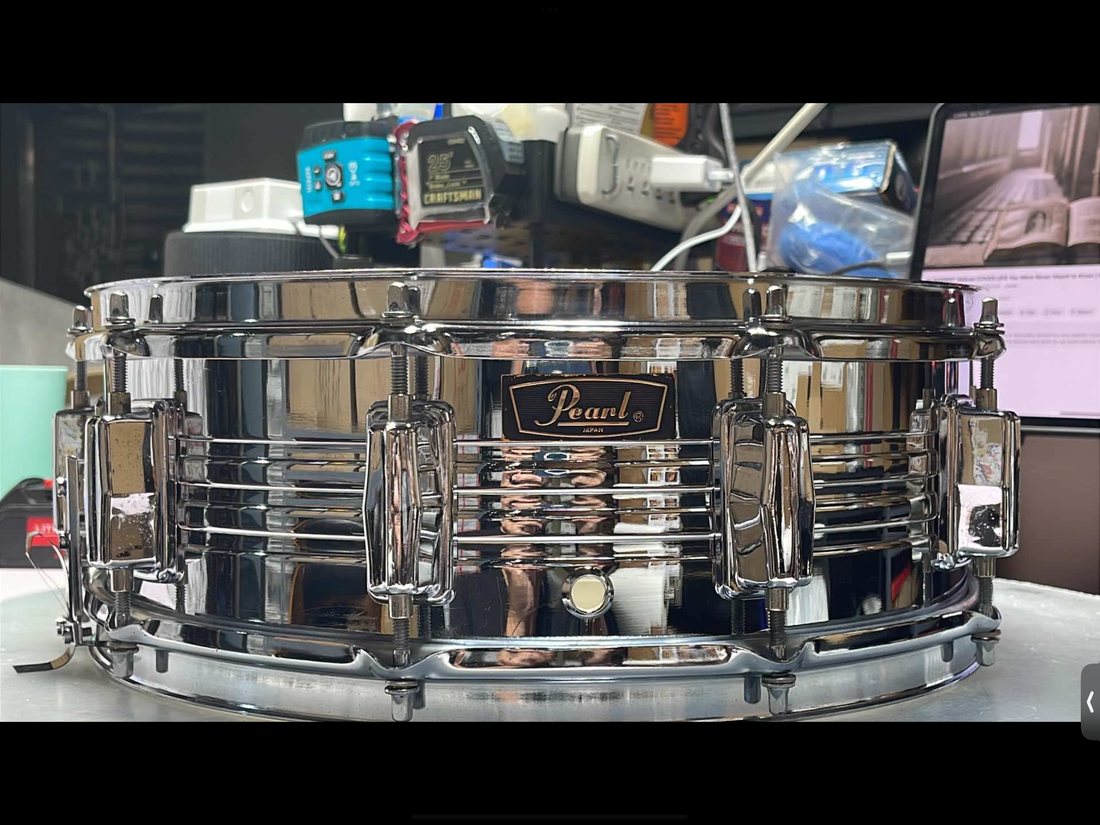 Pearl chrome-over-brass snare drum after restoration