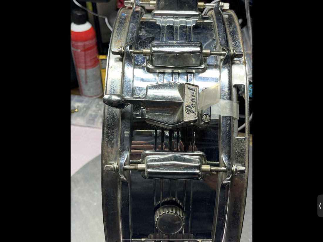 Pearl chrome-over-brass snare drum before restoration