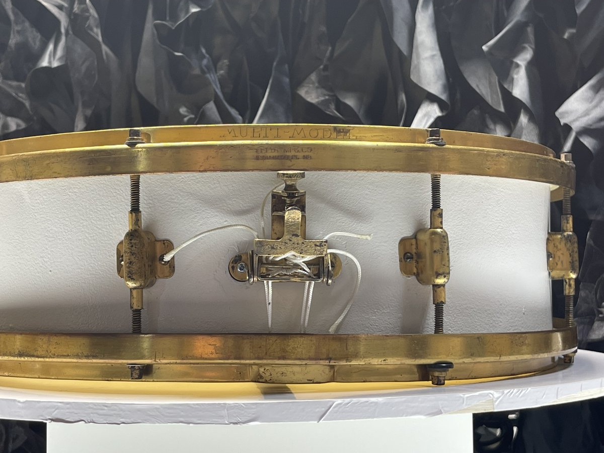 Leedy Multi-Model snare drum with brass hoops and white shell