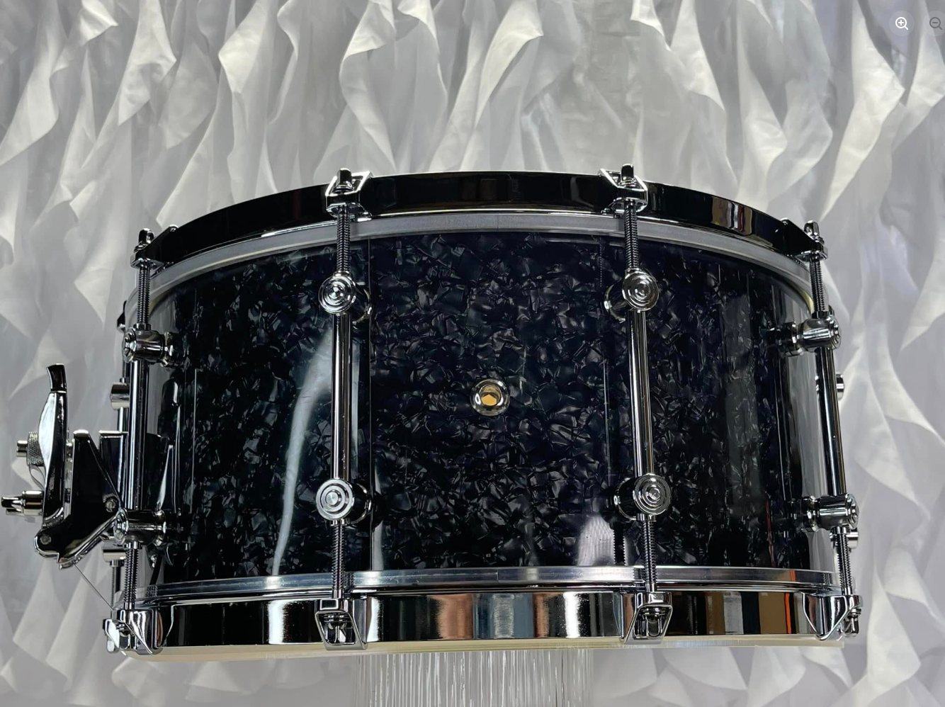 The Retro Custom Maple 14x6.5 snare drum build with black pearl wrap